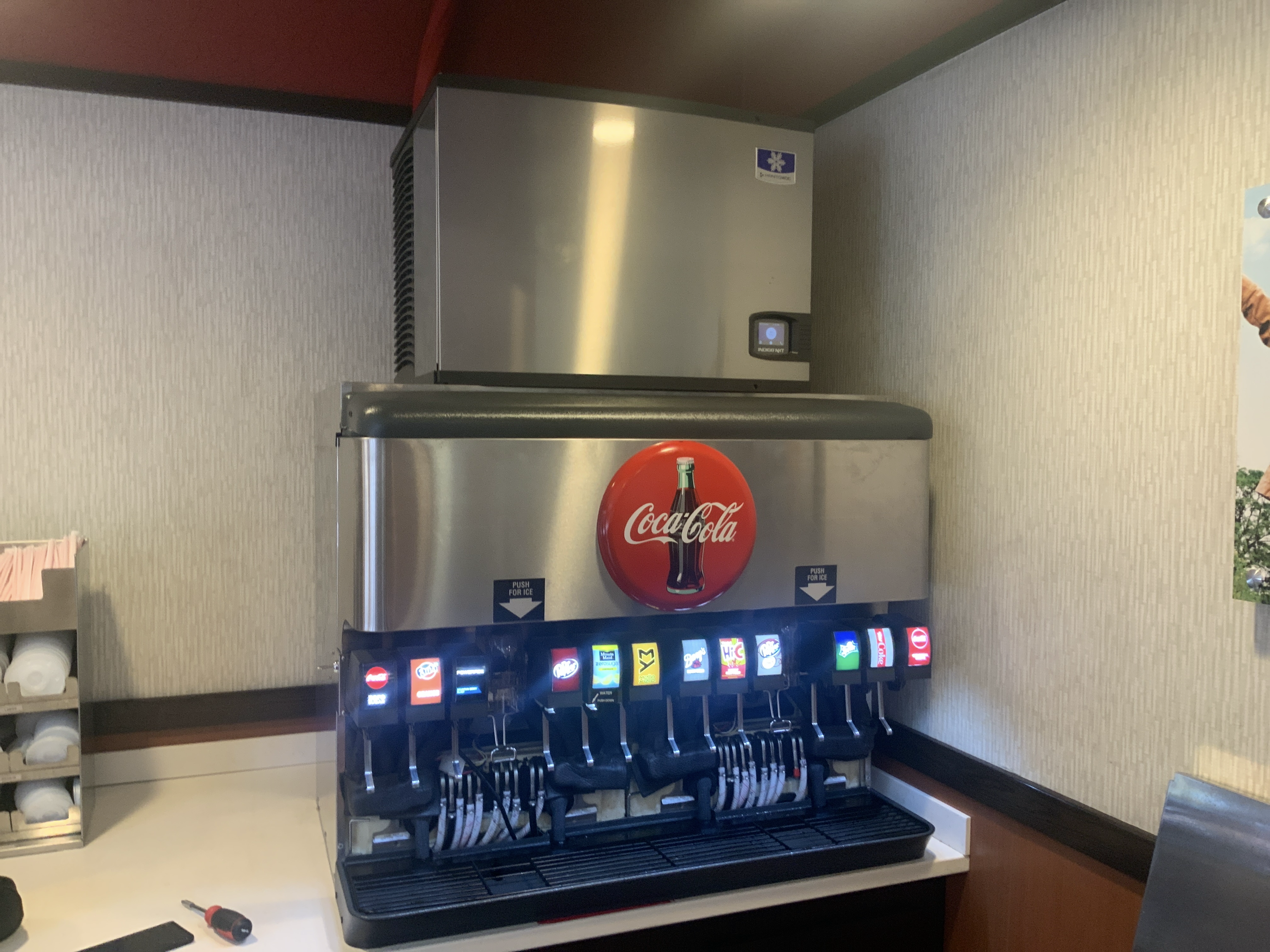 Coca-Cola fountain dispenser with ice machine installation