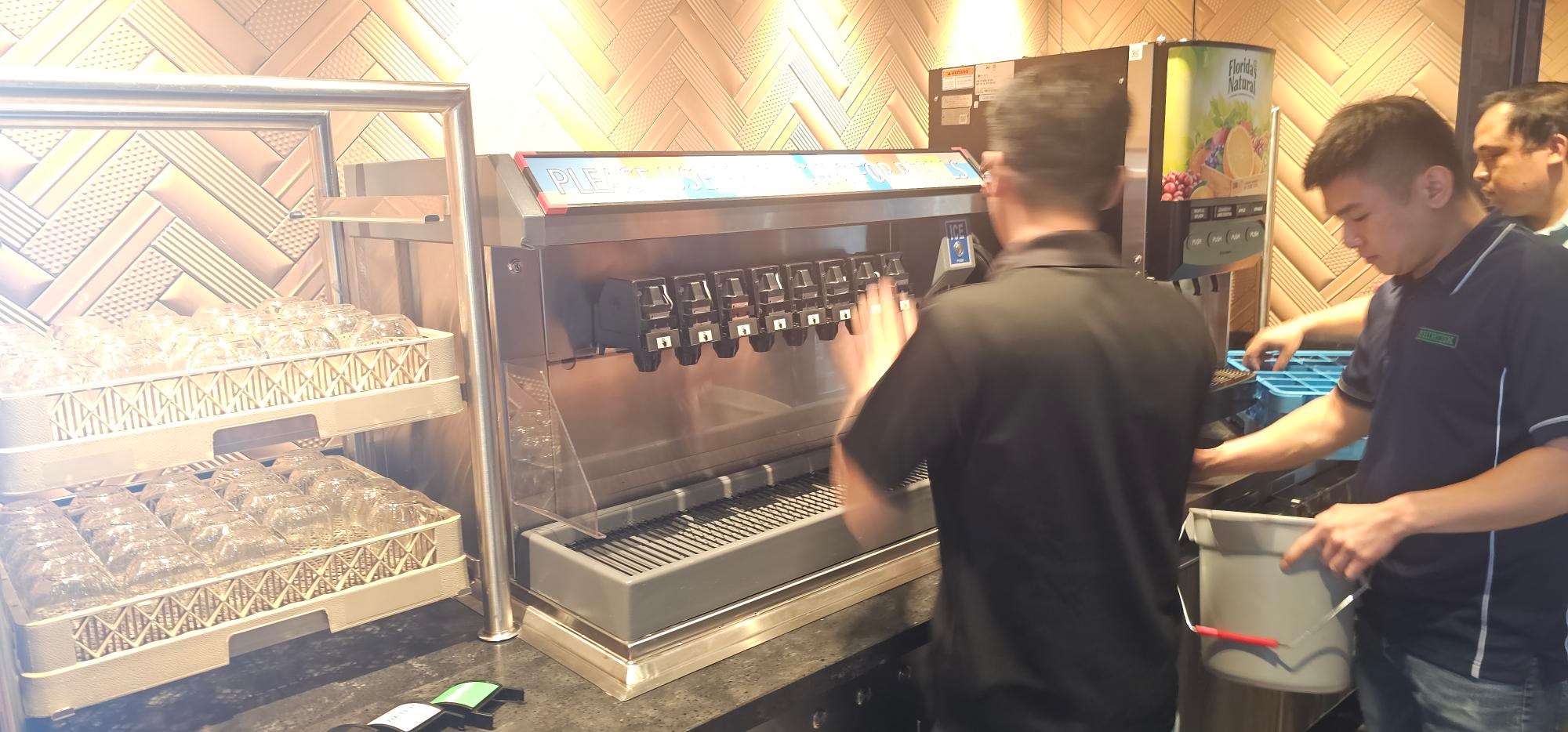 Kabco technicians servicing beverage dispensers on cruise ship