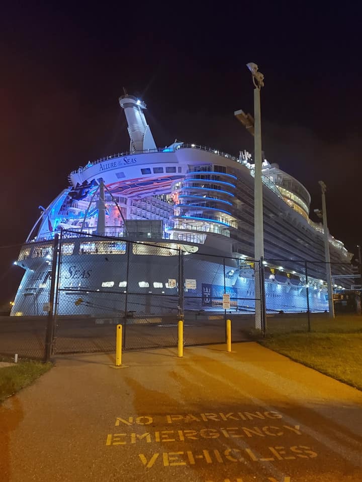Allure of the Seas cruise ship docked at night